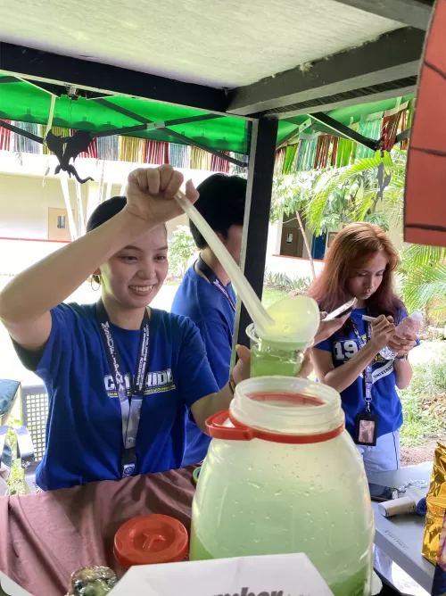 JPAMA officer serves cucumber lemonade